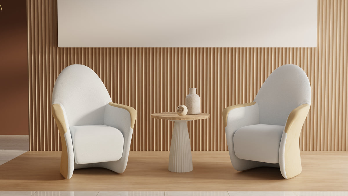 Two light upholstered Attune chairs beside a small table in a warm interior study