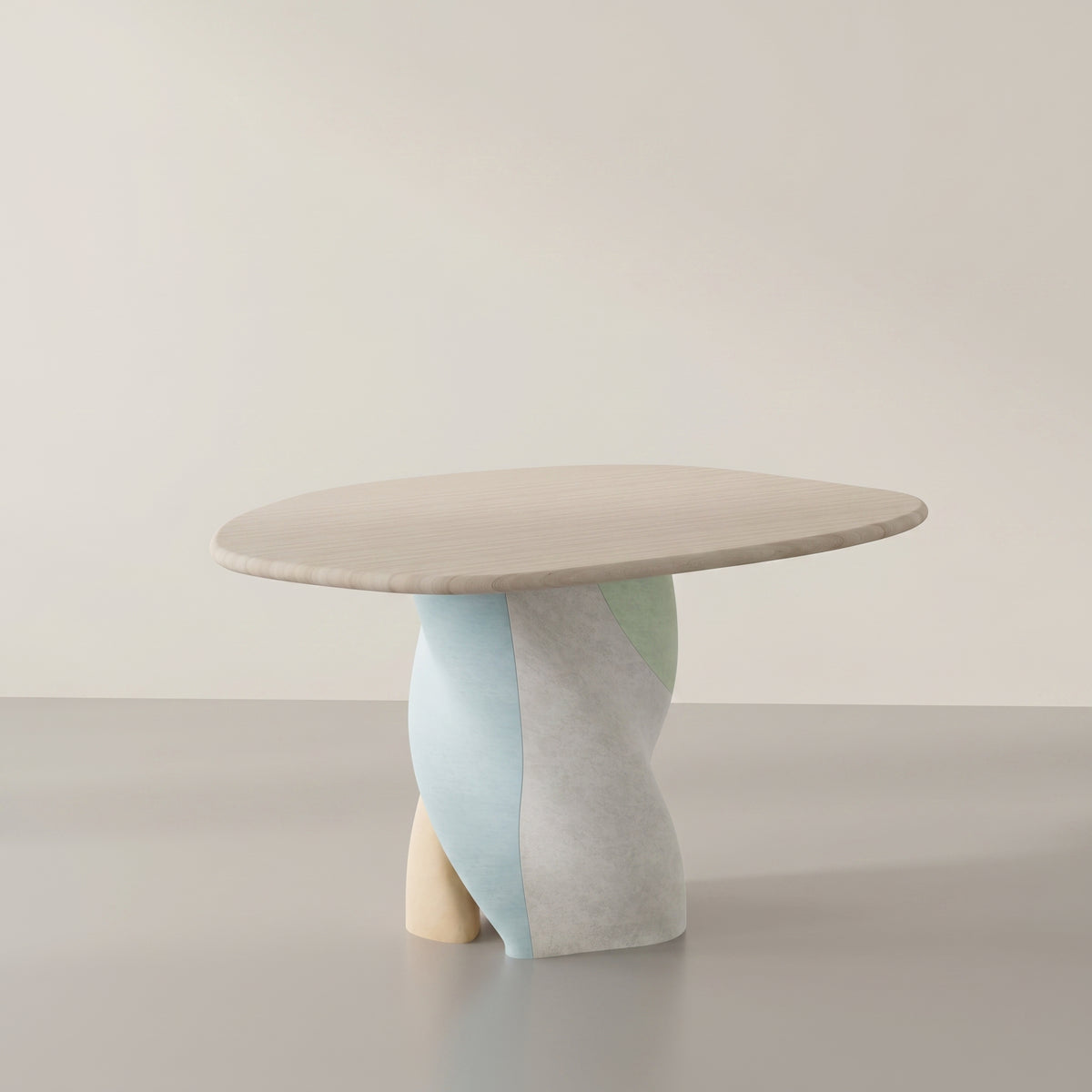 Impressions I viewed from above, showing its round wood top and sculptural base.