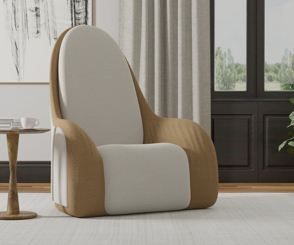 A light upholstered Oyster Listening Chair beside a window and side table in a room study