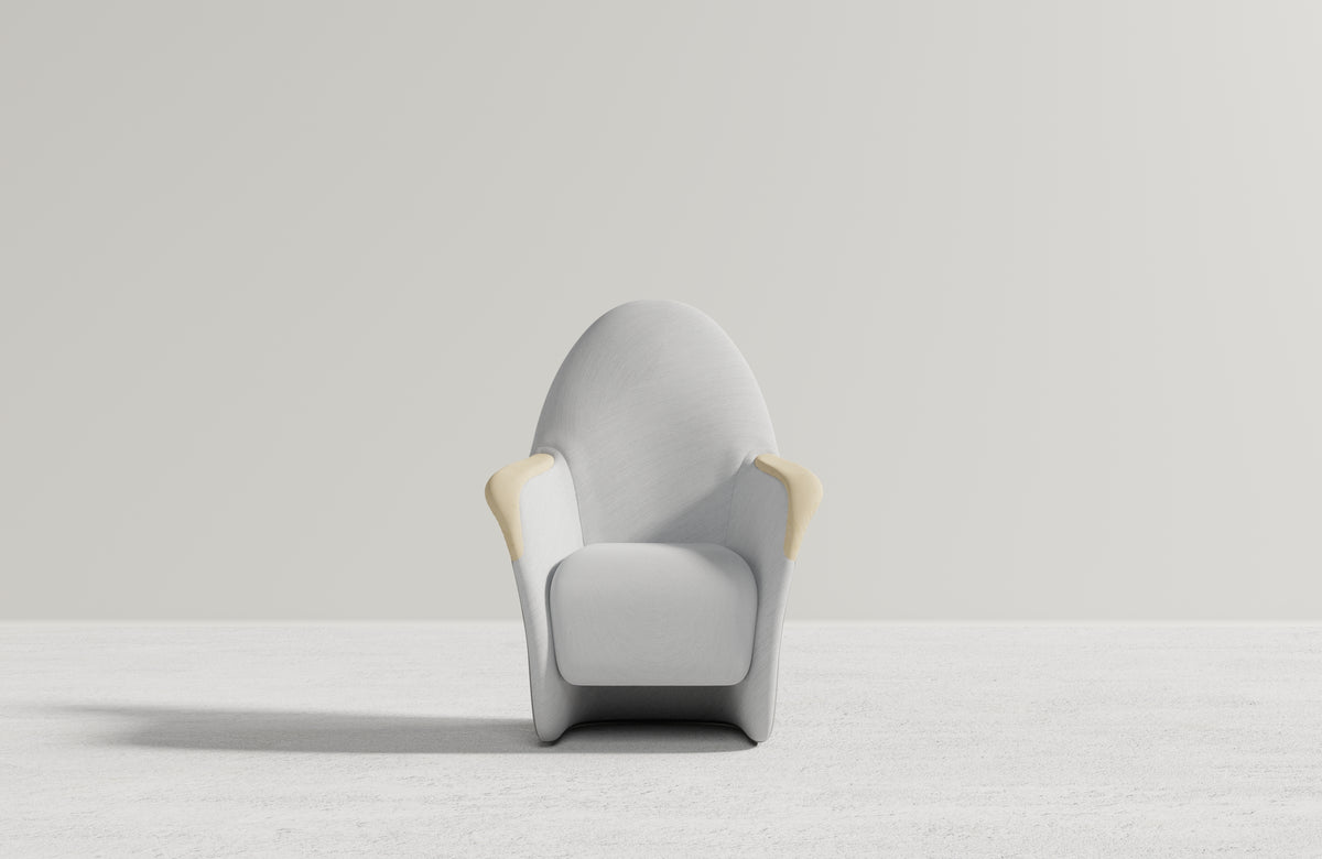Front view of the Attune chair with light gray upholstery and pale timber handrests