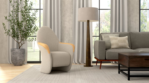 Attune chair with light upholstery and pale timber handrests in a living room beside a sofa